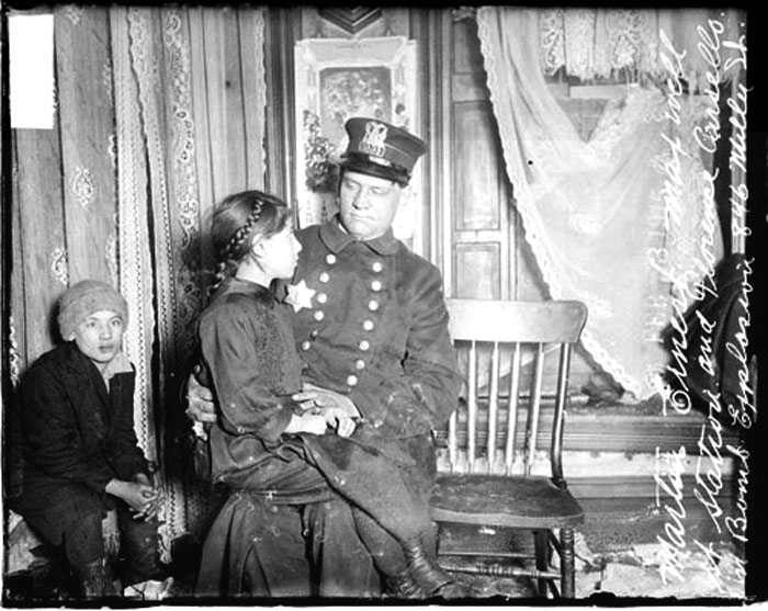 Florence Carsello Sitting on Policeman Martin Ernest's Lap